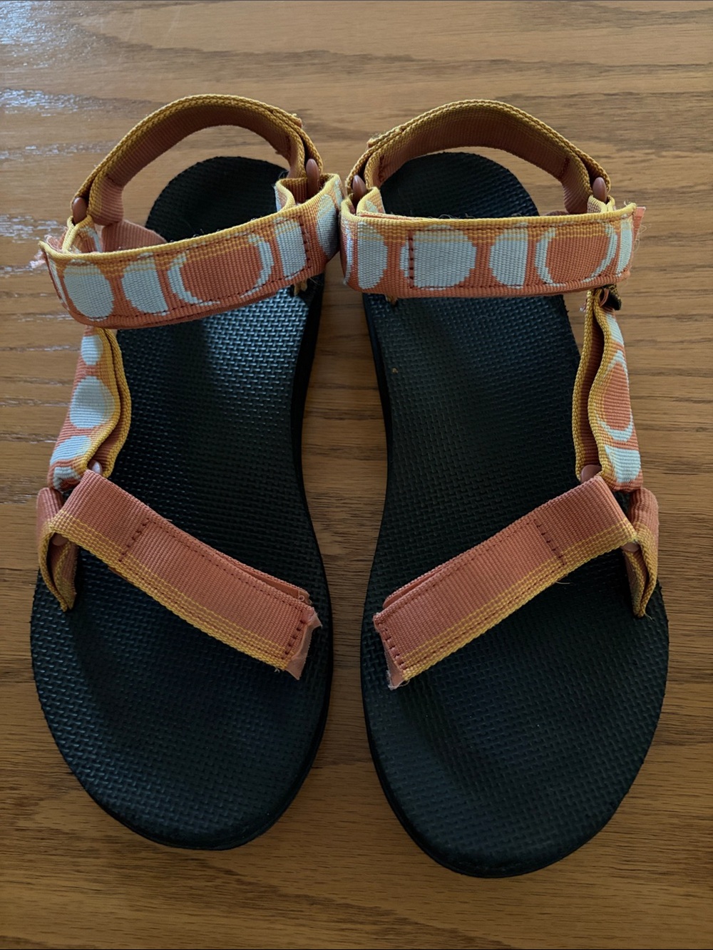 Teva Women's Original Sandals with Orange/Blue Design.